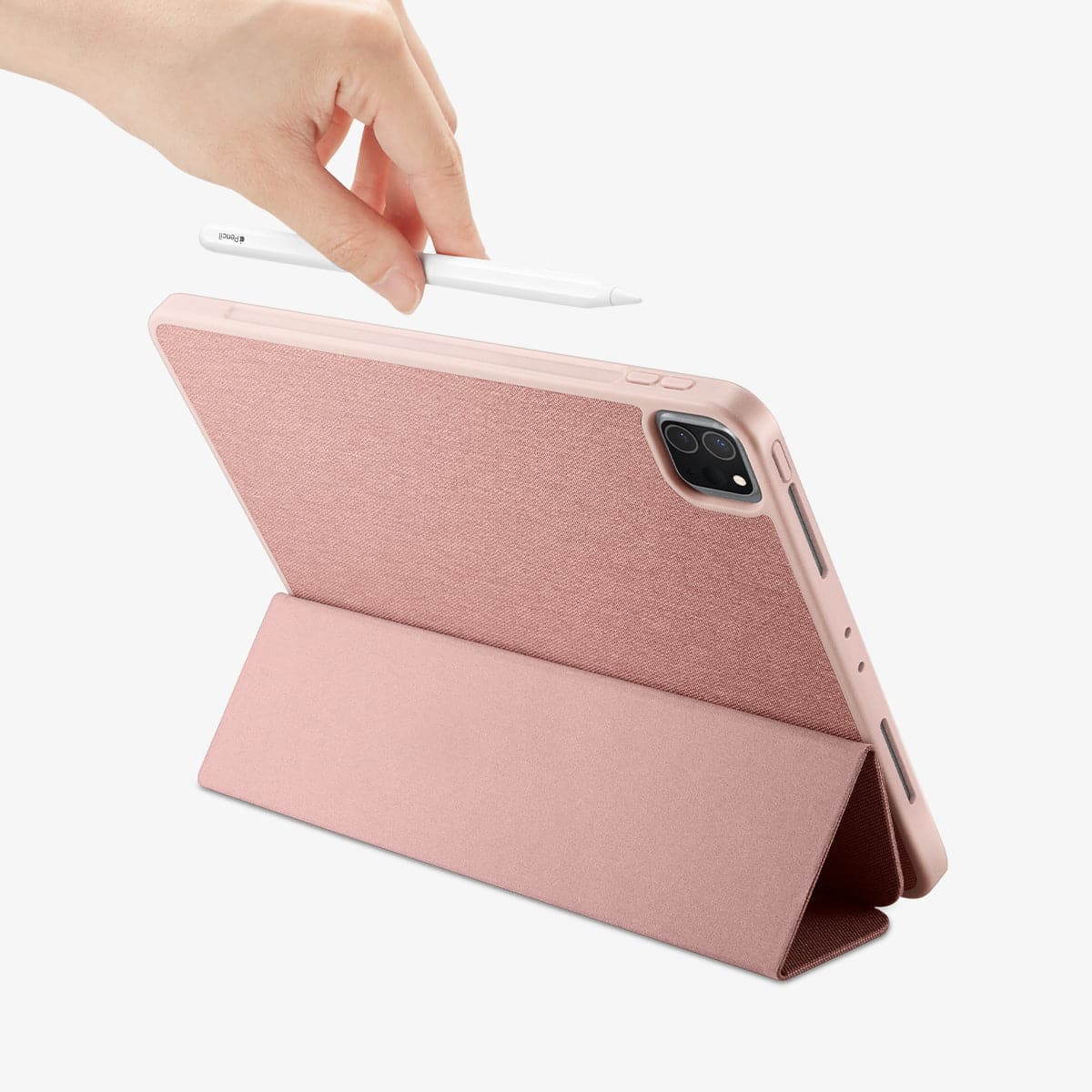 ACS01055 - iPad Pro 11" Case Urban Fit in rose gold showing the back with device propped up by built in kickstand and a hand placing pencil in slot
