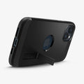 ACS04915 - iPhone 14 Plus Case Tough Armor (MagFit) in black showing the device being propped up horizontally by built in kickstand