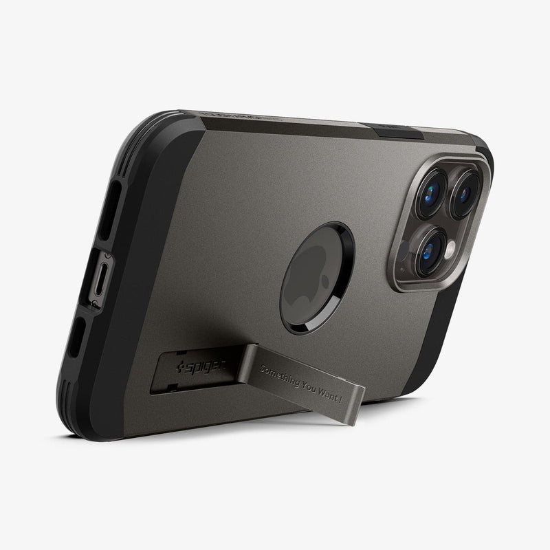 ACS04839 - iPhone 14 Pro Max Case Tough Armor (MagFit) in gunmetal showing the device being propped up horizontally by built in kickstand