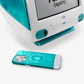 ACS06743 - iPhone 15 Pro Case Classic C1 (MagFit) in bondi blue showing the device laying beside an old model of mac