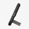 ACS06732 - iPhone 15 Pro Case Tough Armor (MagFit) in gunmetal showing the bottom with device propped up by built in kickstand