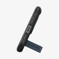 ACS06734 - iPhone 15 Pro Case Tough Armor (MagFit) in metal slate showing the bottom with device propped up by built in kickstand