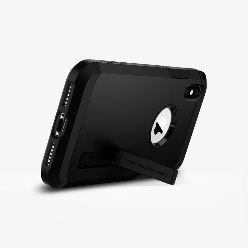 065CS25130 - iPhone XS Max Case Tough Armor in black showing the device propped up by built in kickstand