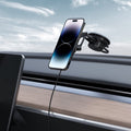 ACP04629 - OneTap Pro 3 Black Dash Magnetic Car Mount (MagFit) in black showing the mount inside of a car with device mounted