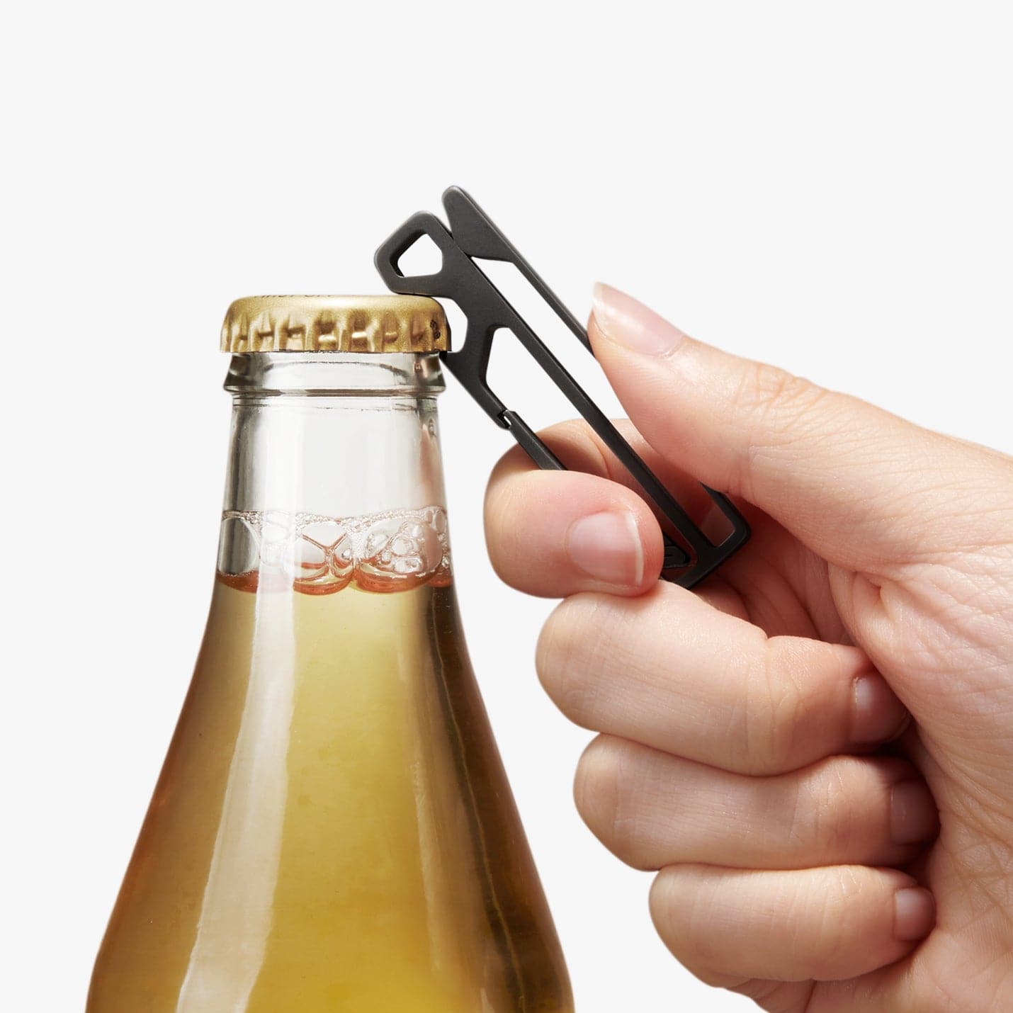 AHP05318 - Key Holder Clip Metal Fit in black showing the clip being used to open a beer bottle
