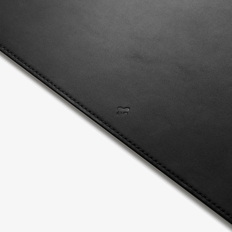 APP05267 - LD302M Magnetic Desk Pad in black showing the front zoomed in on Spigen logo