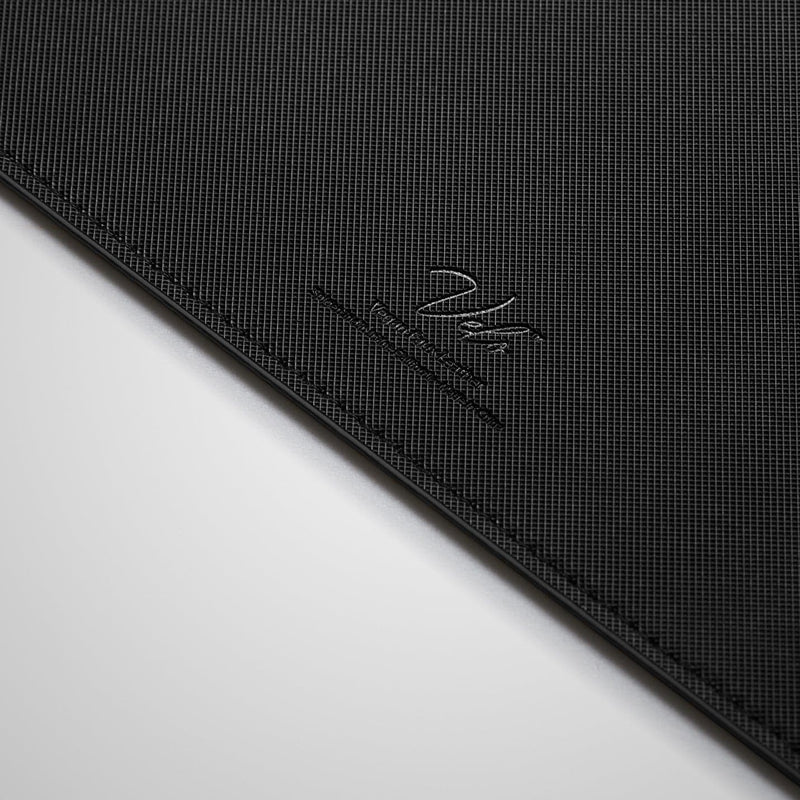 APP05267 - LD302M Magnetic Desk Pad in black showing the back zoomed in on vegan leather logo