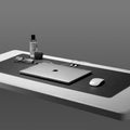 APP05267 - LD302M Magnetic Desk Pad in black showing the desk pad on a desk with laptop, mouse, glasses, wireless earbuds on top