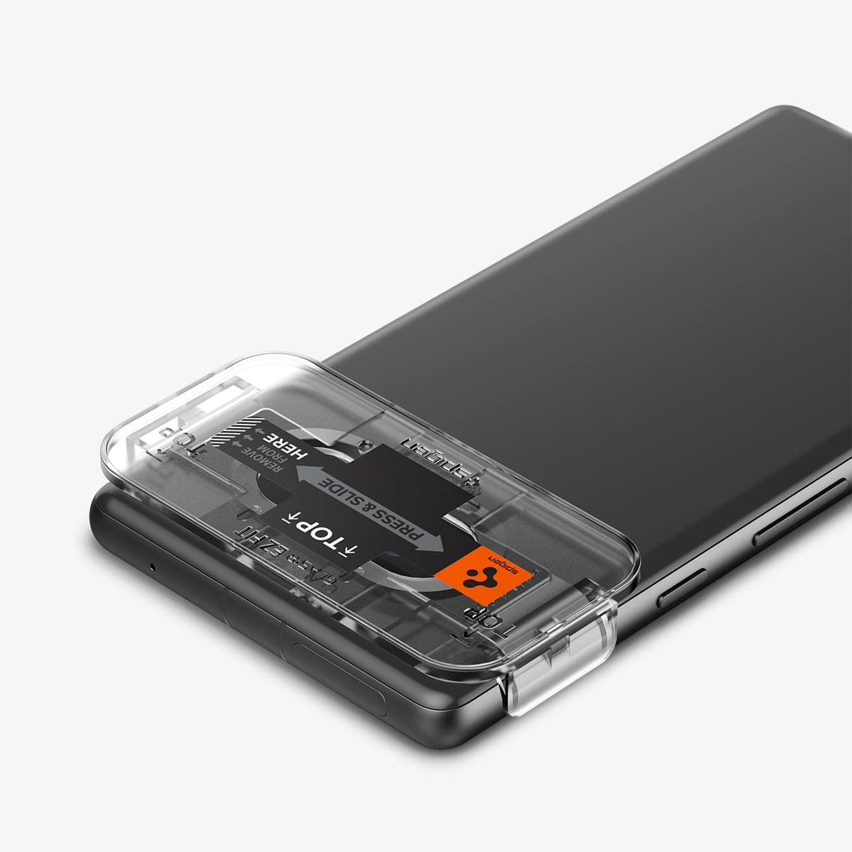 AGL05970 - Pixel 7a Glas.tR EZFit Optik Lens Protector in black showing the back, top and side with ez fit tray installed on device camera