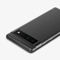 AGL05970 - Pixel 7a Glas.tR EZFit Optik Lens Protector in black showing the back, top and side
