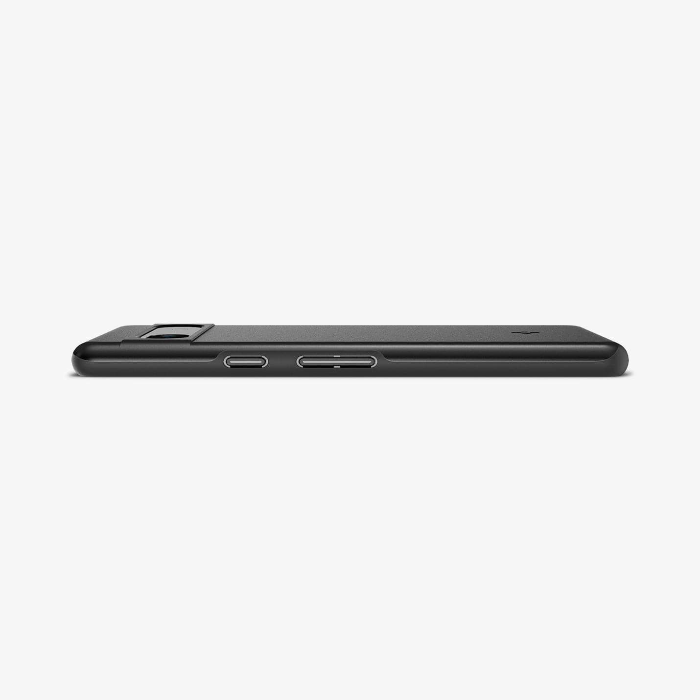 ACS05814 - Pixel 7a Case Thin Fit in black showing the side and partial back with device laying flat