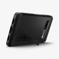ACS05819 - Pixel 7a Case Tough Armor in black showing the back and bottom with device propped up by built in kickstand