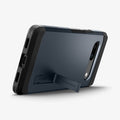 ACS05820 - Pixel 7a Case Tough Armor in metal slate showing the back and bottom with device propped up by built in kickstand