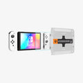 AGL03829 - Nintendo Switch OLED Screen Protector EZ Fit GLAS.tR showing the ez fit tray and screen protector in front of device