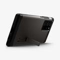 ACS01397 - Galaxy Note 20 Ultra Tough Armor Case in gunmetal showing the back and bottom with device propped up by built in kickstand