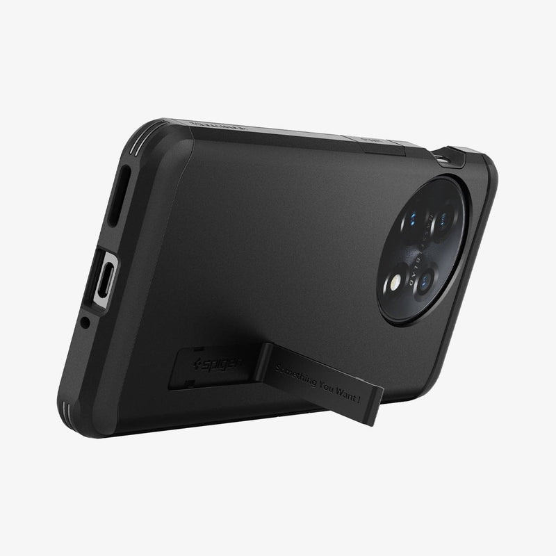 ACS05800 - OnePlus 11 Series Tough Armor Case in Black showing the back partial bottom zoomed in with built-in kickstand propped up