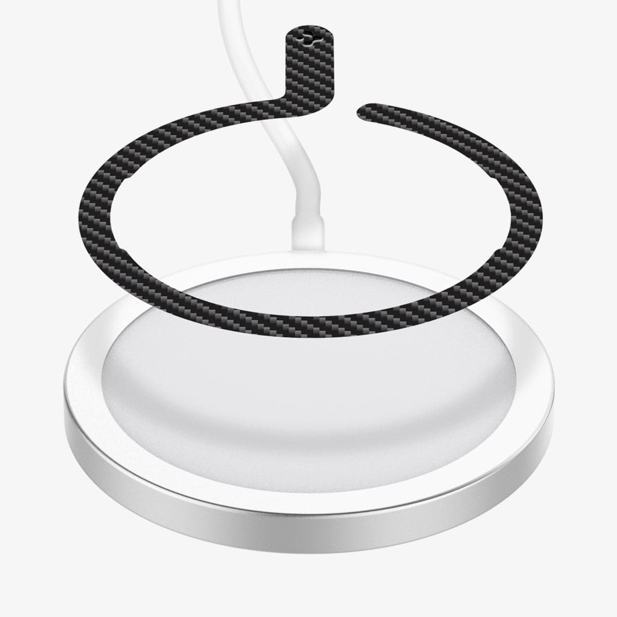 ACP03804 - OneTap MagSafe Metal Plate (MagFit) in carbon showing the metal plate hovering above a magsafe charger
