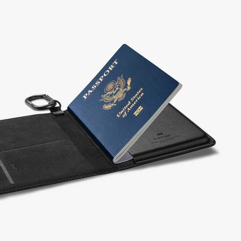 AFA05538 - Passport Holder in black showing the inside with passport in slot and carabiner