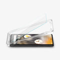 AGL04695 - Pixel 6a Screen Protector Alignmaster showing the screen protector and alignmaster tray being installed onto device