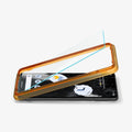 AGL05199 - Pixel 7 Screen Protector AlignMaster GLAS.tR showing the device laying flat and alignment tray with screen protector being installed onto it