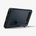 ACS04480 - Pixel 6a Case Tough Armor in metal slate showing the back and bottom with device propped up horizontally by built in kickstand
