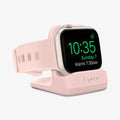 000CD21183 - Apple Watch Night Stand S350 in pink showing the front and partial side with watch on stand