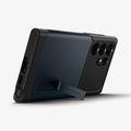ACS05640 - Galaxy S23 Ultra Case Slim Armor in metal slate showing the back and bottom with device propped up horizontally by built in kickstand