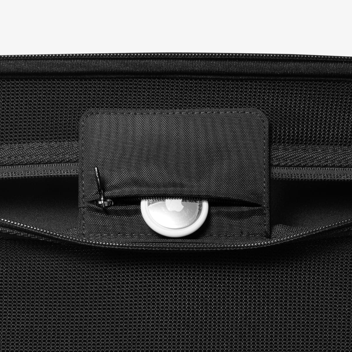 AFA03731 - Steam Deck Case Rugged Armor Pro Sleeve in black showing the airtag slot on the inside of case