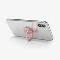 000SR24436 - Style Ring 360 in rose gold showing the phone propped up by ring attached to back of device