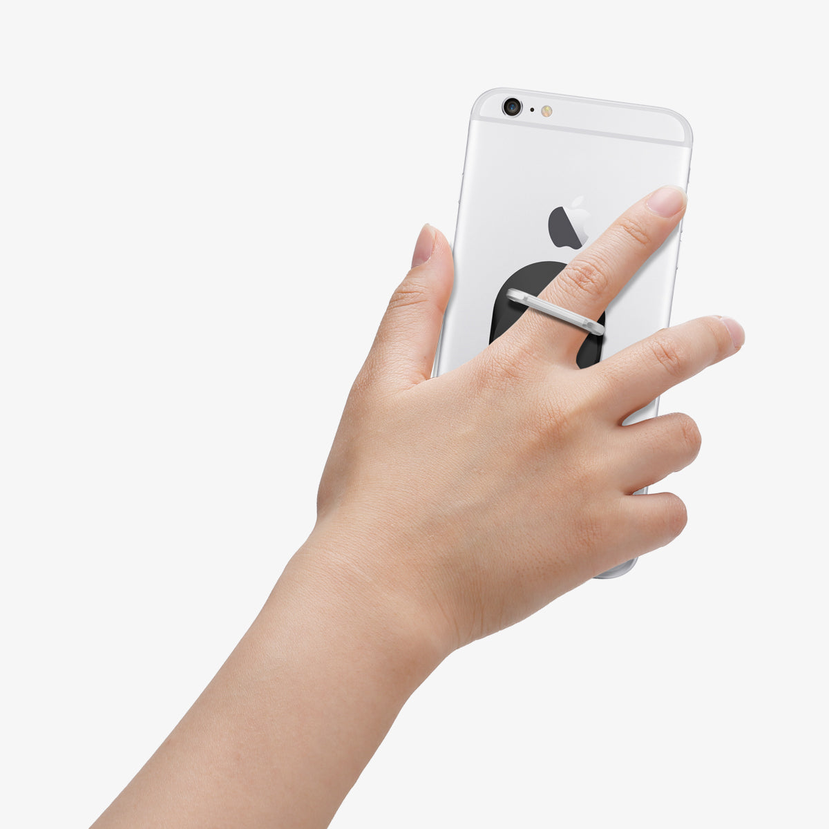SGP11845 - Style Ring in black showing the phone in someone's hand with ring attached to back of device