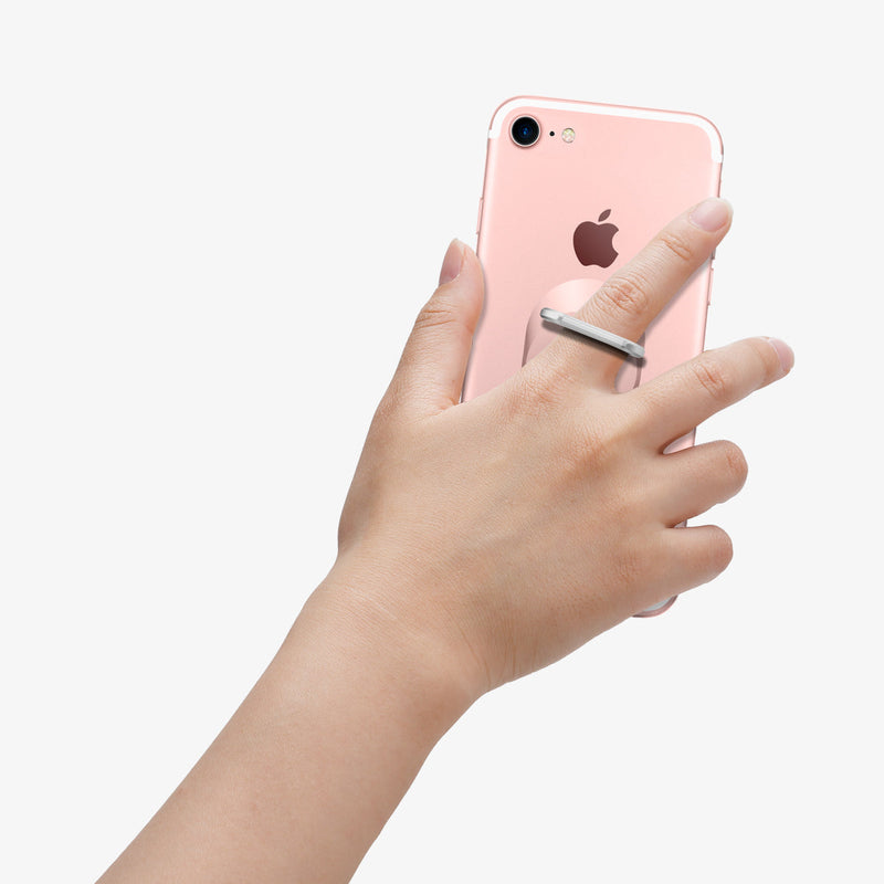 SGP11846 - Style Ring in rose gold showing the phone in someone's hand and ring attached to back of device