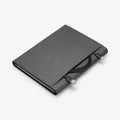 J06CS25185 - Surface Go 3 Case Stand Folio in charcoal gray showing the back with charging cable sticking out of storage slot