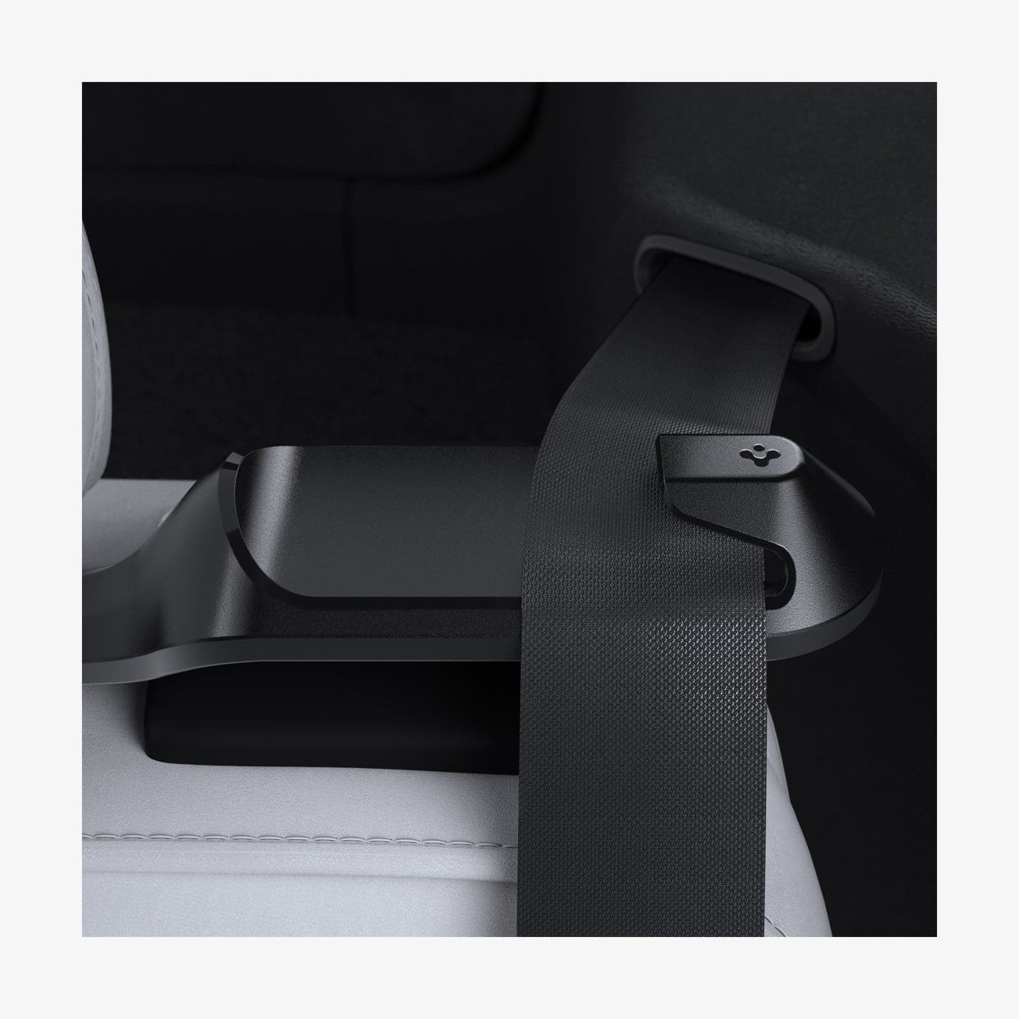 ACP06041 - Tesla Model Y Backseat Seatbelt Guide in black showing the top view of guide installed in car