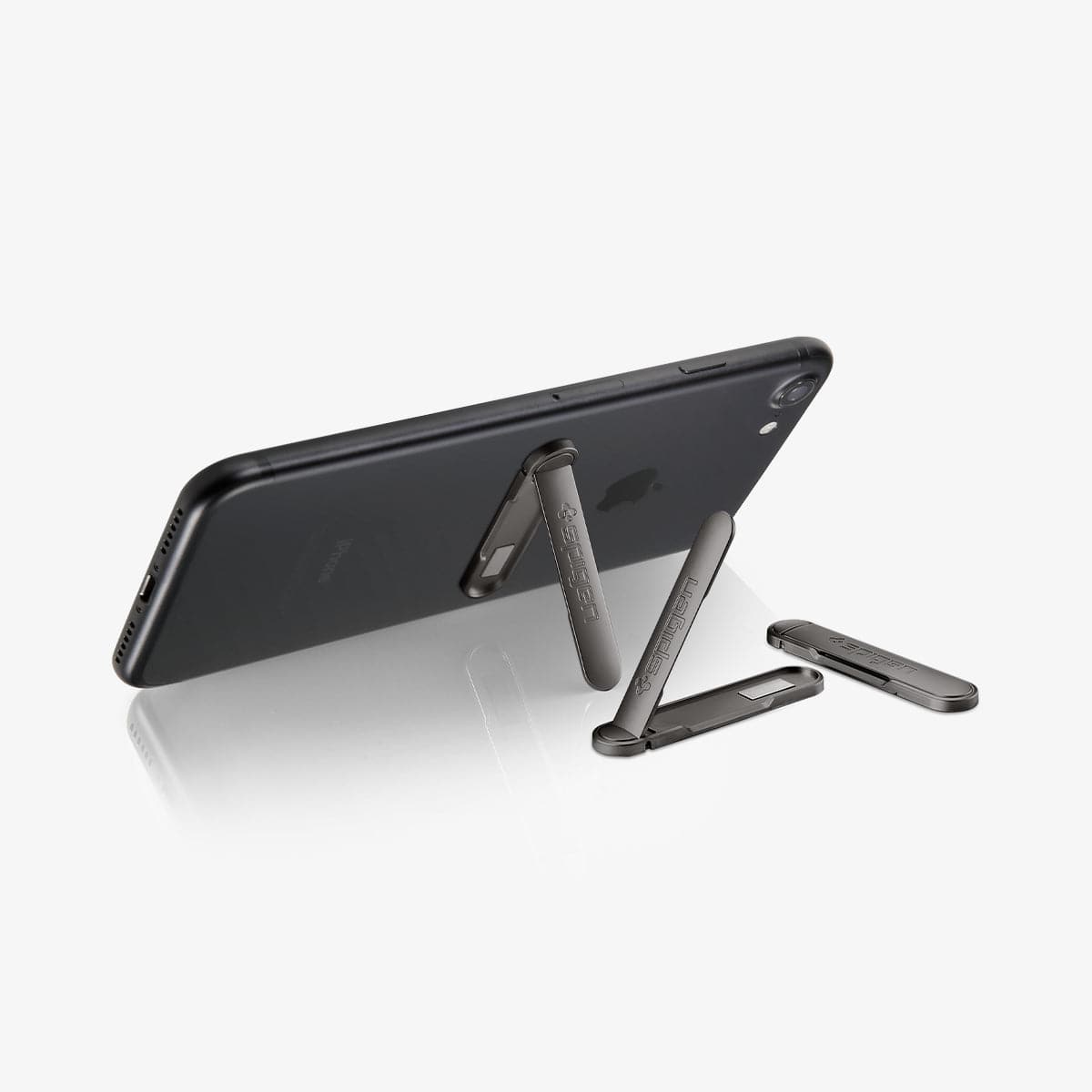 000EM20860 - U100 Universal Kickstand (Metal) in gunmetal showing the phone propped up by kickstand attached