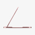 000EM21073 - U100 Universal Kickstand (Metal) in rose gold showing the side with kickstand extended out