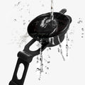 ACP05506 - UTS35 OneTap Universal Car Mount Dashboard showing water hitting the bottom adhesive