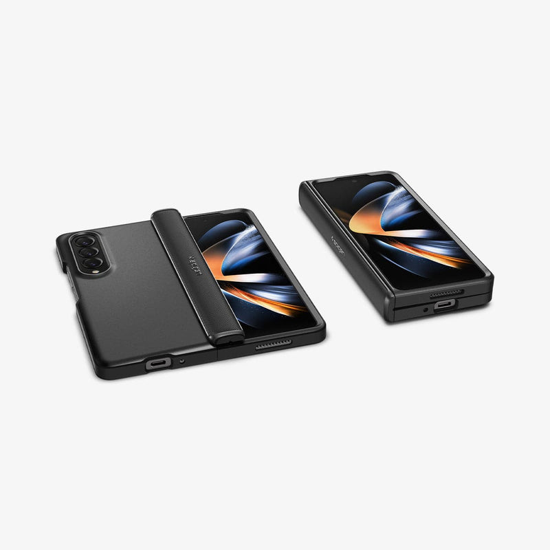 ACS05107 - Galaxy Z Fold 4 Case Slim Armor Pro in black showing the back and front with device laying flat and another device folded next to it