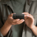 ACS05609 - Galaxy S23 Ultra Case Thin Fit in black showing the device in someone's hand