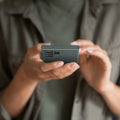ACS06077 - Galaxy S23 Ultra Case Thin Fit in abyss green showing the device in someone's hand