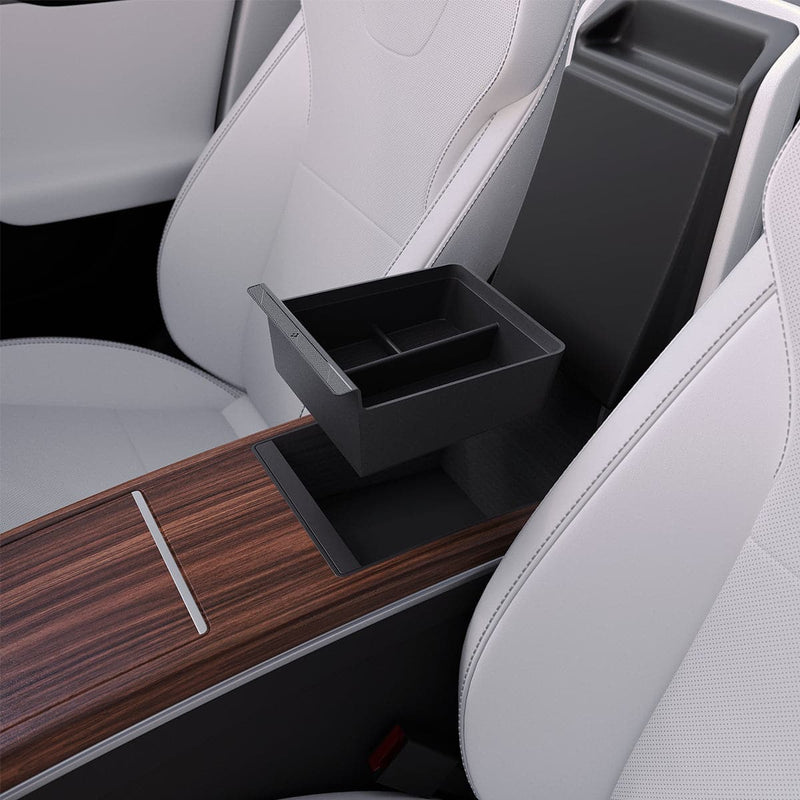ACP06952 - Tesla Model S & X Center Console Organizer Tray in black showing the tray hovering above the center console inside of vehicle
