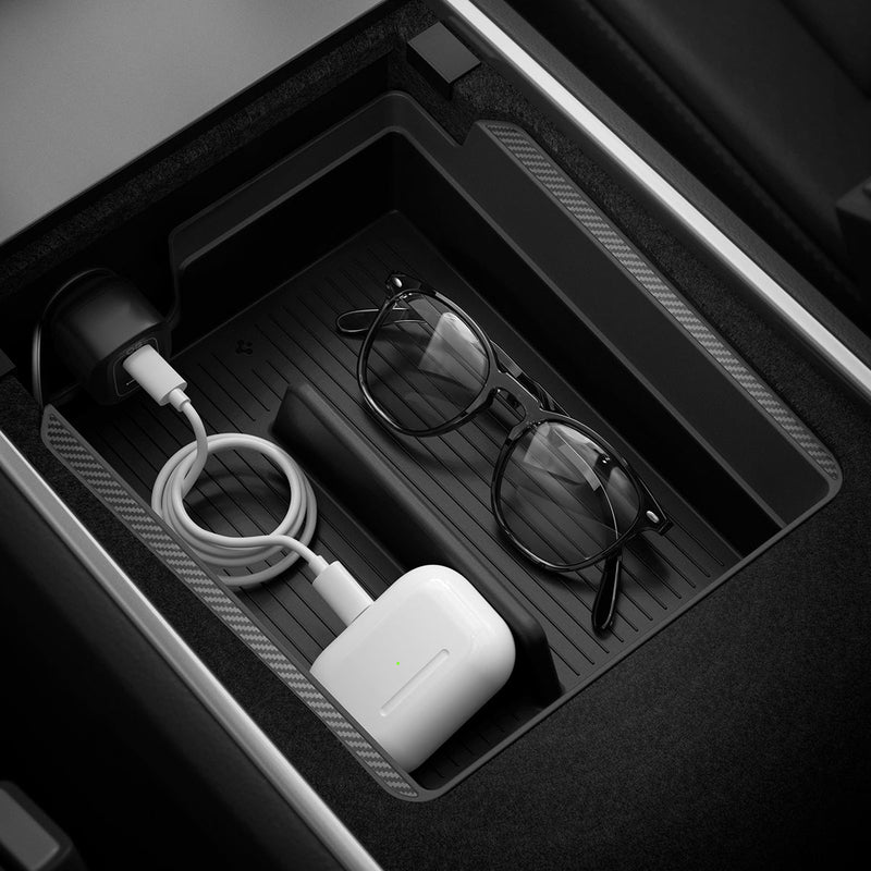 ACP06258 - Tesla Model 3 & Y Armrest Console Organizer in black showing the top view inside of car with airpods and sunglasses