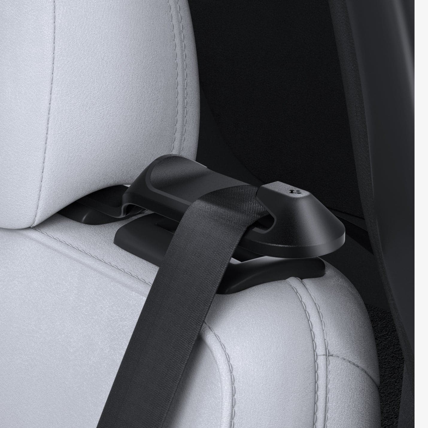 ACP06041 - Tesla Model Y Backseat Seatbelt Guide in black showing the guide with seatbelt installed